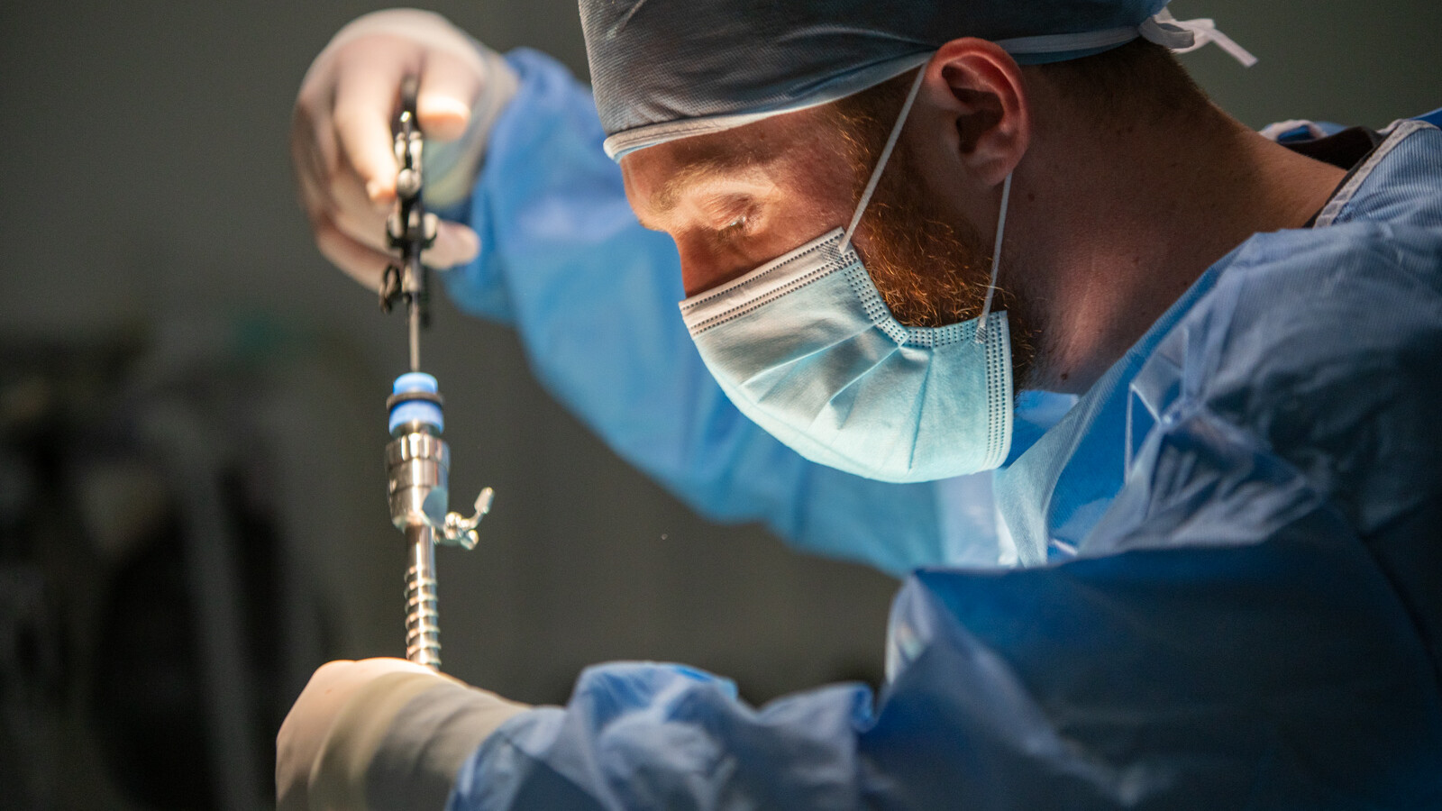Clinical technical photography of vet performing laparoscopic surgery